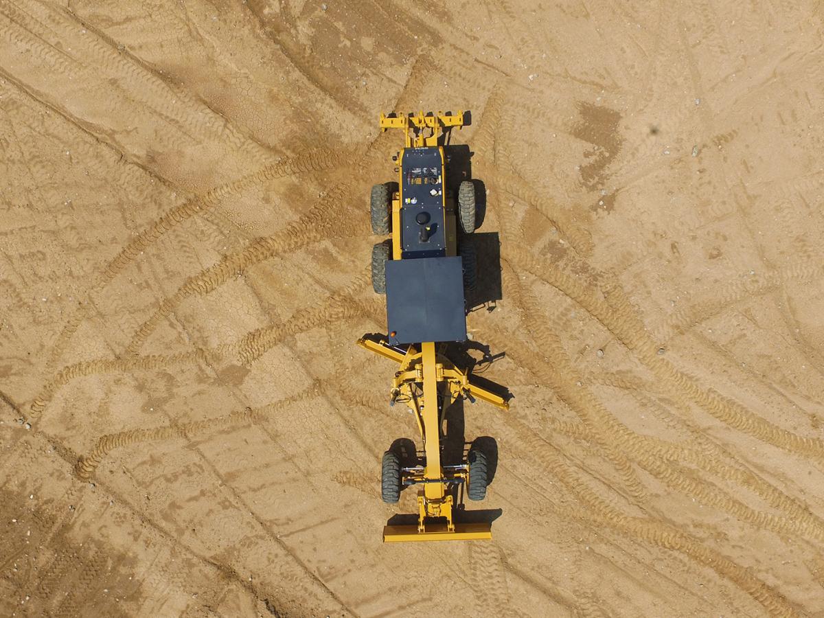 SEM motor grader in operation